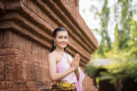 Beautiful Woman wearing typical Thai dress